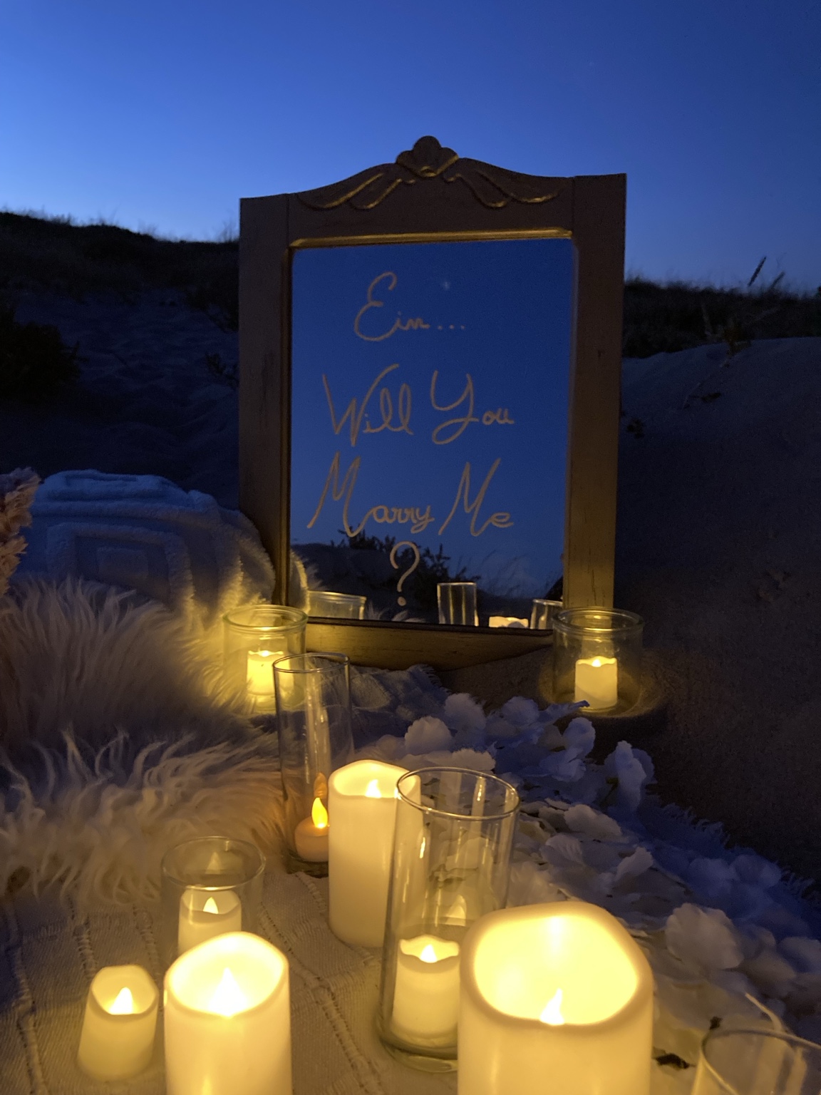 Candlelit proposal mirror